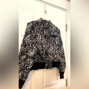 Great condition, medium sized Cheetah print jacket, soft dry fit material.